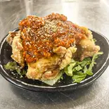 鶏モモ竜田揚げ～ガーリックオイルがけ～（焼き鳥居酒屋チキンハート駒川中野店）
