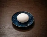 生卵（うまそうなラーメン屋ジャンク店）