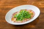 低温ローストした牛タンのカルパッチョ（PASTAVOLA 田町本店）