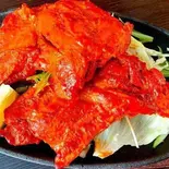 タンドリーチキン/Tandoori Chicken（ラフィングブッタ ネパール・インドレストラン）