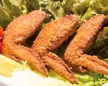 当店人気№3 手羽先100グラム 約2本Chicken Drumette 100g（中津からあげ 総本家もり山 吹田店）