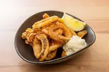 真イカのリング揚げ（"生パスタ専門店"東京チキンボーイ新宿十二社通り店 (ワイガヤ新宿十二社通り店)）