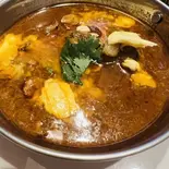 チキンボーンカレー(骨付きチキン) Chicken with bone curry（NAMASTE ASIAN KITCHEN AND HALAL SHOP）