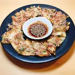 カリカリチーズチヂミ（たべ呑み屋 じゅじゅ）