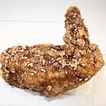 旨辛ダレ手羽先1本（元祖からあげ本舗 金太郎 平間店）