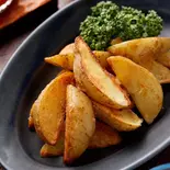 皮付きフライドポテト French fries with skin（【1日500食売れる本場カレー】トップスパイス Top Spice 高田馬場店）