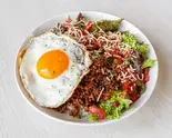 自家製タコライス目玉焼きのせ Homemade Taco Rice with Fried Egg Topping（スタンドココペリ (CAFE＆BAR Thunderbird)）