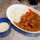 もつ煮カレーライス(温泉玉子つき)（もつ煮込み 世界のかさじま）
