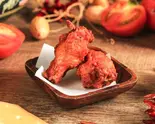 骨付き唐揚げ (1本)Fried Chicken (1 piece)(太陽のトマト麺 大塚北口店)