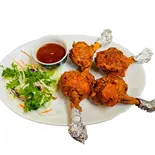 チキン出羽先から揚げ~ chicken lollipops (3p)（インド＆タイ料理スマイル Indian ＆ Thai restaurant ＆Bar~Smile）