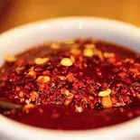スパイシーチリソース Spicy Chili Sauce（とろ〜り温玉とフレッシュ野菜のタコライス 新川崎鹿島田店）