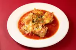 若鶏とベーコンの重ね焼き（レストラン ポルポ）