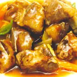 スペアリブの甘酢煮込み/Sweet and sour spareribs(中華料理 龍門)