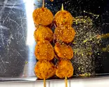 魚団子串揚げ2本（蜀王砂鍋マーラータン）