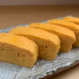 たまごの出汁巻き（焼鳥・おでん KUSIO 寺田町店）
