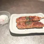 つくね棒の温玉添え（串揚げ 麒麟）
