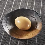 味玉(1個)（魚介と豚骨のWスープが決め手！ つけ麺 総本山 無双 博多店）