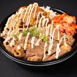 牛の本気スタミナ丼(にんにく牛カルビ、唐揚げ2、キムチ50、マヨネーズ)（【腹パン確定の店！】どどん屋）