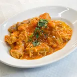 トリッパのトマト煮込み（イタリアンレストラン ウラヌス）