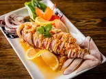 73プラムックヌンマナオ (茹でイカのレモンソースがけ)（タイ料理 ウライワン）