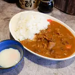 大盛もつ煮カレーライス(温泉玉子つき)（もつ煮込み 世界のかさじま）