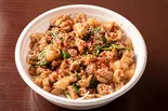 特製もつホルモン丼（満腹どんぶりメシ 楽一）