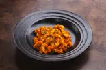 名物トリッパのトマト煮込み(オステリアポルコヴィーノ)