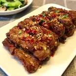【当店人気No.3】スペアリブの塩胡椒炒め(椒盐排骨)（聚香源）