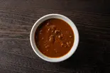 牛煮込みちょいカレー（【炭火焼き】柔らかヘルシー肉のり弁ハラミ太郎 元住吉店）