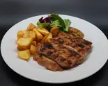 鳥取県産大山鶏もも肉のグリル Grilled Chicken thigh（俺のイタリアン 新橋赤レンガ通）