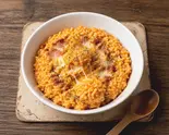 334kcal 完熟トマトの濃厚酸味とトロけるコク!高密度チーズリゾット(チーズリゾット草堂)