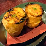 ハニばたガーリックトースト（おおたマルシェ - とろ〜りカルボー飯とスパイスごはん！ -）