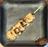 若鶏ももにんにく串 たれ 1本（丼デリ成増店）