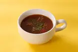 トマトコンソメスープ Tomato Consommé Soup（【濃厚チーズ＆アボカド】天才のタコライス 幡ヶ谷店）