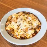 成田式麻婆豆腐焼きチーズのせをのっけた麻婆丼（チャイニーズビストロ かがり）