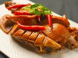 栄昌の辛味醤油煮板鴨 (1/4匹)/荣昌辣板鸭 (1/4只)（楽山楽・甘皮鴨専門店）