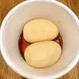 自家製トロトロ半熟煮たまご(2個) Seasoned soft boiled egg（白金とんかつ王龍）