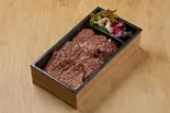 日替わり炭火焼肉弁当(ご飯中)（北新地はらみ別邸）