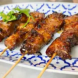 ムーピン(タイ風豚串焼き)2本（オリジナルタイカレー オラワン）