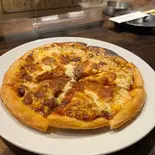 照り焼きピザ（焼鳥・おでん KUSIO 寺田町店）