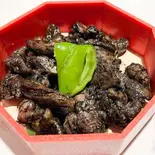 地鶏の炭火焼き（桜羽）