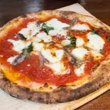 ピッツァロマーナ～tomatesouse annchovy and oregano mozzarella cheese～（Pizzeria Regista）