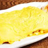 だし巻き玉子 Dashi-Rolled Egg（浪花かすうどん むねひろ）
