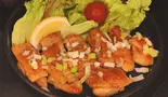 鶏モモの鉄板塩焼き（お好み焼き 鉄板焼 満まん）