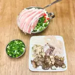 【贅沢】牛豚海鮮焼き~牛すじ・豚・ネギ・アサリ・えび・タコ・イカ入り~(お好み焼き ひろ)