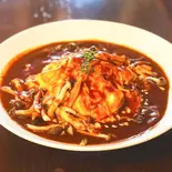とろけるチーズのデミグラスソースオムライス（kokoFLAT cafe 本町）