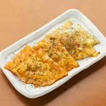 カリカリ焼きチーズ（鉄板焼き＆お好み焼き どーなが）