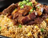 豚バラ肉チャーハン（黄金の華 ニッケコルトンプラザ店）