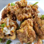 唐揚げの黒胡椒かけ（七左食堂）