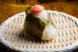明太子おにぎりrice ball coated with cod roe（【おにぎりと豚汁】明治屋～白楽店～）